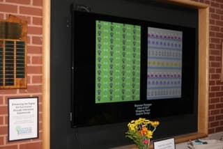 Students viewing the digital art gallery